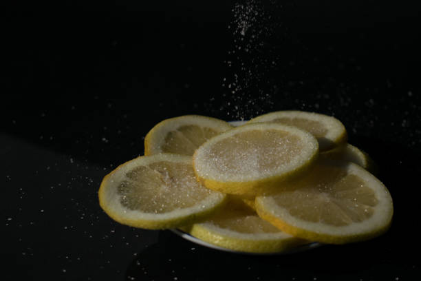 istock lemon slices with sugar being poured 1284787309