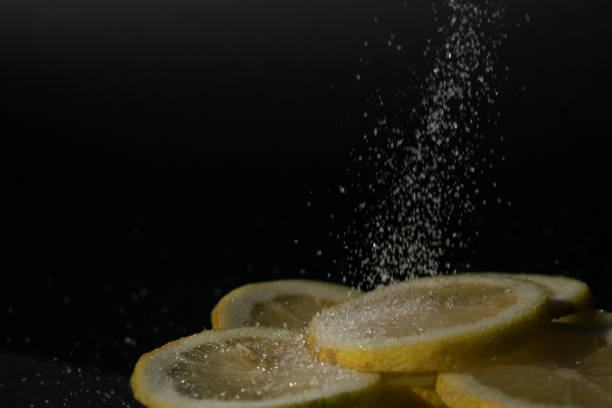 istock lemon slices with sugar being poured 1284787324