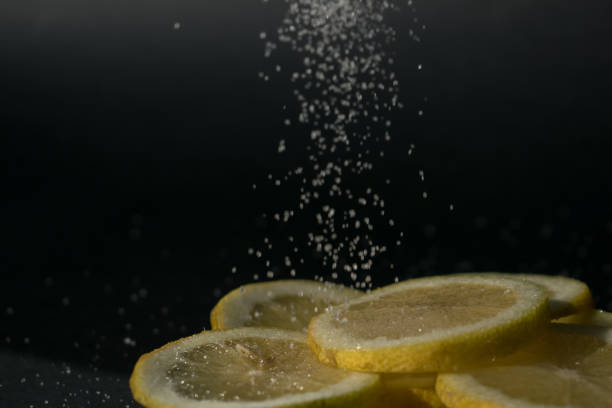 istock lemon slices with sugar being poured 1284787345