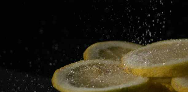 istock lemon slices with sugar being poured 1284787352