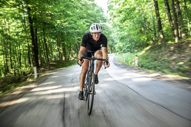istock Man riding a bike 1284788190
