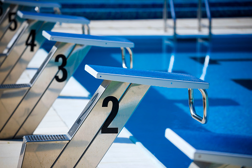 Detail of the swimming start block at the empty pool due to a pandemic