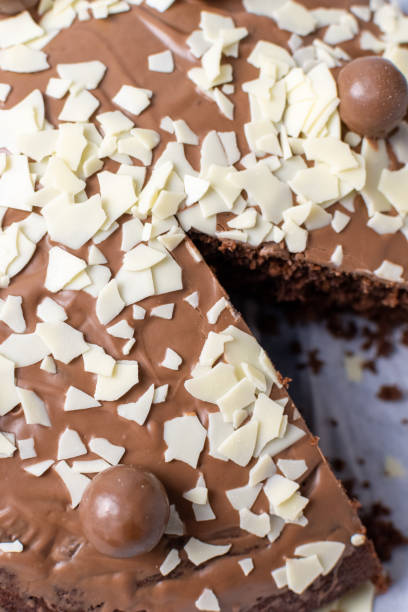 istock Chocolate cake with white shavings on 1284795547