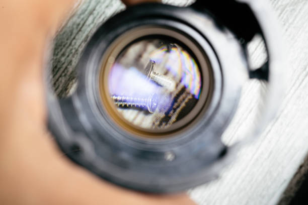 istock Some tiny screws seen on a loupe lens from an unmade camera lens close up still 1284798540