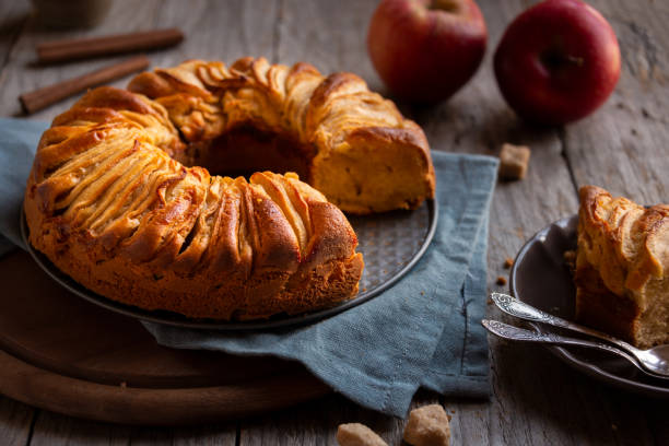 istock Homemade delicious apple pie with sliced apple and cinnamon 1284798598