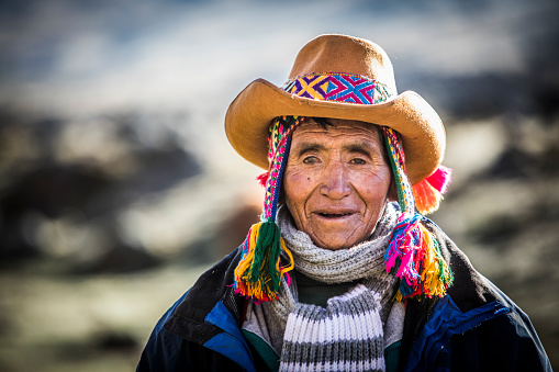 Indigenous man portrait living traditional life in the mountains.