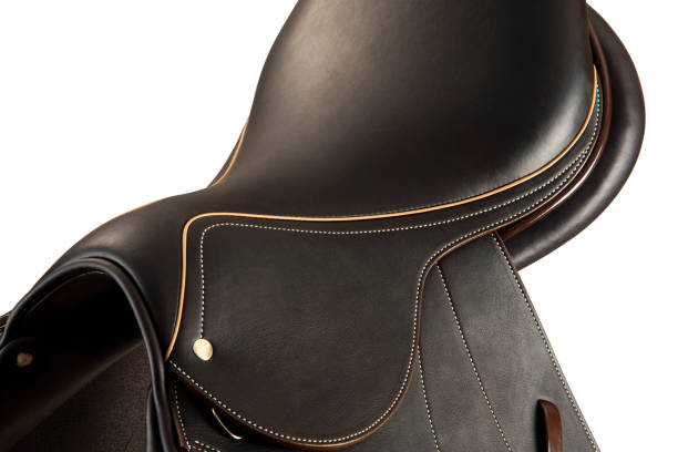 istock Horse riding saddles on white 1284801066