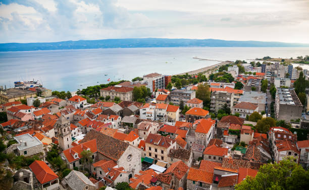 istock Omis old town and residential houses 1284802076