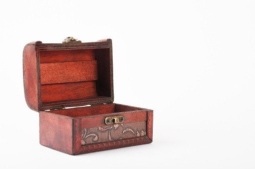 Wooden mini chest made of handicraft, suitable for keeping small jewelry, good for home use, white background, isolated perfect for artwork, selective focus