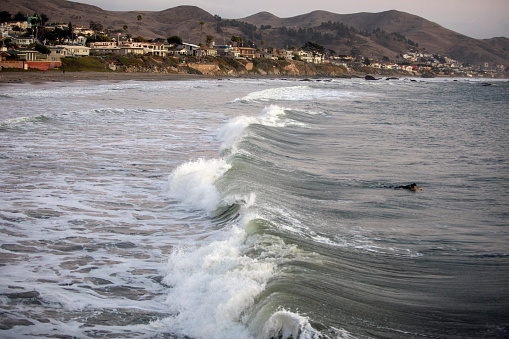 Ocean waves in the bay in Cayuco bay San Luis Obispo county California. Shot take late afternoon.
