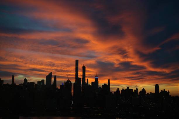 istock Dramatic sky above midtown in New York City 1284809722