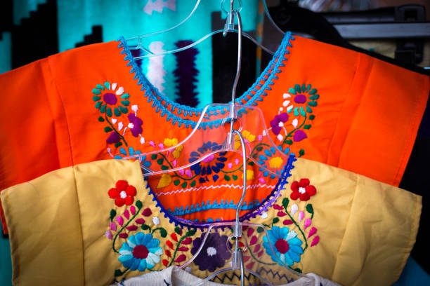 Tlacolula de Matamoros, Mexico - March 2, 2025: Clothing vendors at the Sunday Market in Tlacolula de Matamoros, Oaxaca, Mexico.