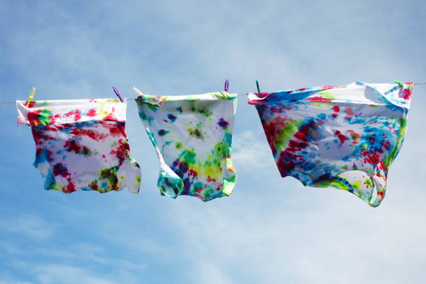 istock Tie Dye T-Shirts on Washing Line 1284811470