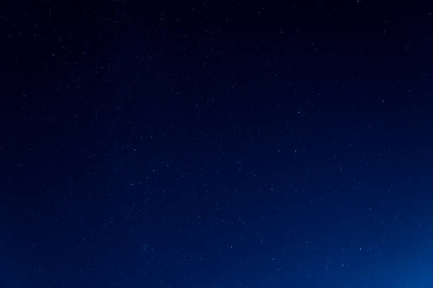 istock Night sky background with many shining stars, endless space concept 1284811577
