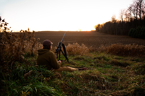 A young hunter out in the evening.  Many hunters start out in the sport in their teens.  ru