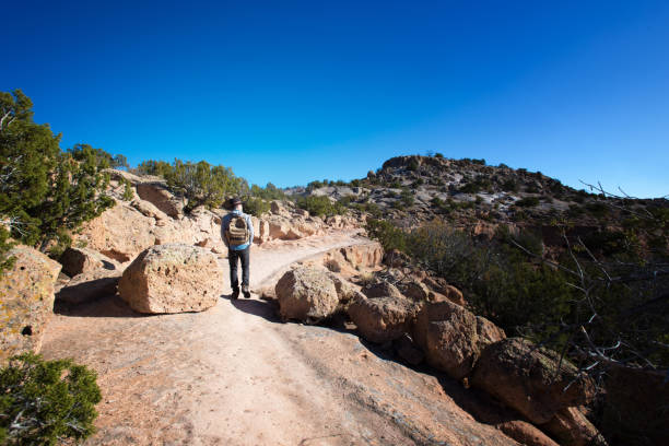istock Hiker at Tsankawi Trail, Bandelier National Monument, NM 1284817362