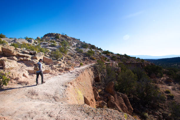 istock Hiker at Tsankawi Trail, Bandelier National Monument, NM 1284817393