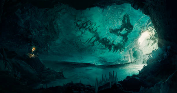 człowiek (odkrywca) odkrywając dużą zamarzniętą skamielinę w pięknej jaskini lodowej - stalactite zdjęcia i obrazy z banku zdjęć