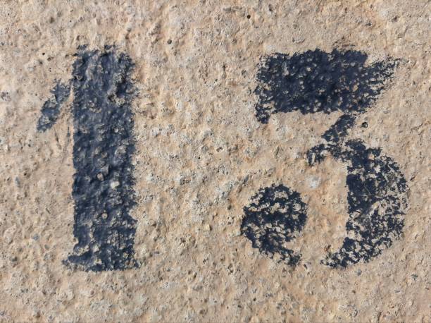 istock number thirteen painted stencil on concrete wall, number 1284819212
