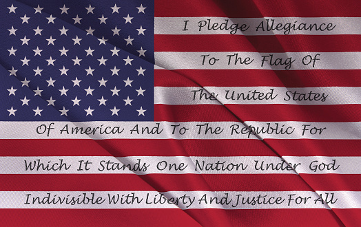 American Flag With The Pledge Of Allegiance Printed On The Stripes