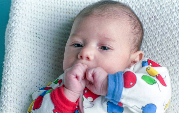 istock Cute Baby Latino Baby Lying on His Back 1284827521