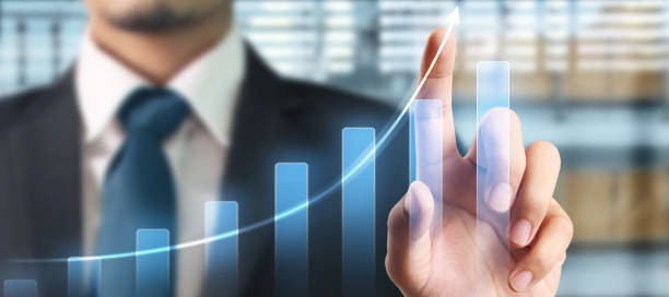 istock Businessman plan graph growth and increase of chart positive indicators in his business 1284834981