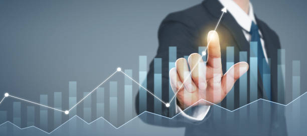 istock Businessman plan graph growth and increase of chart positive indicators in his business 1284835000