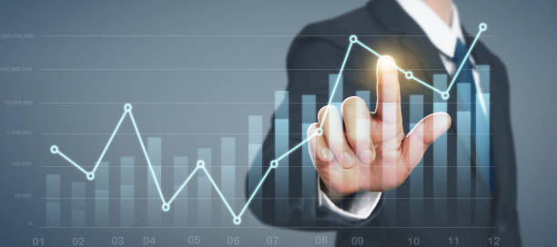 istock Businessman plan graph growth and increase of chart positive indicators in his business 1284835002