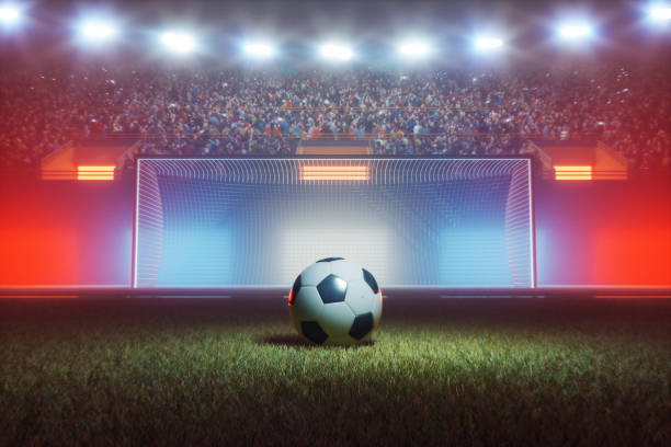 футбольный стадион ночью - penalty shot стоковые фото и изображения