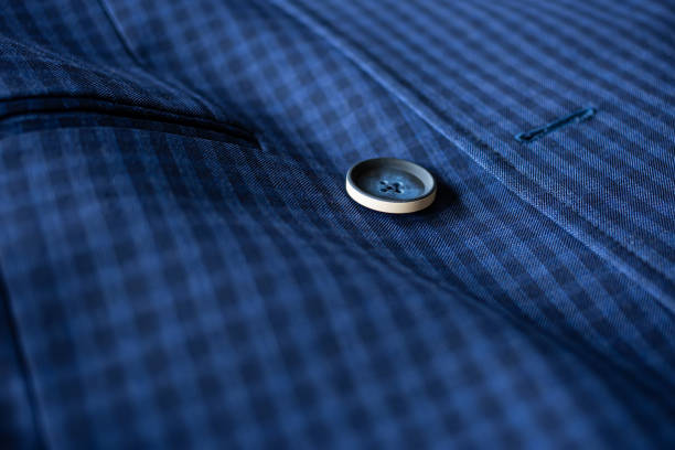 istock The blue suit cloth was laid on the floor and there was space for adding text. Blue fabric with buttons and pockets for tailoring. 1284844186