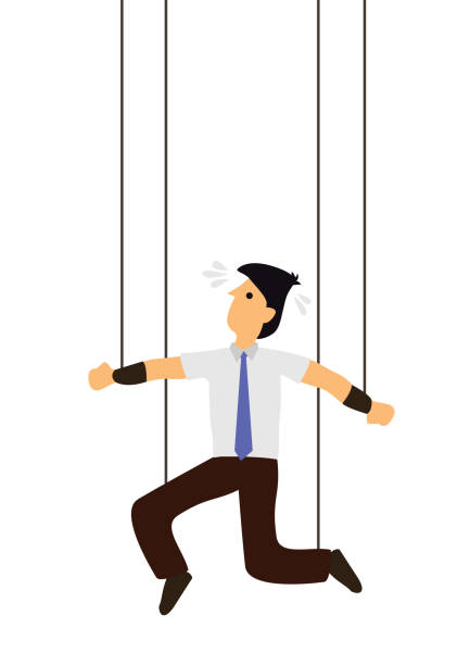 istock Business concept of a businessman being controlled like a puppet. 1284844232