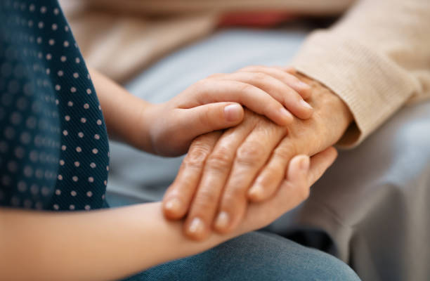 istock Granddaughter supporting her grandmother. 1284850127