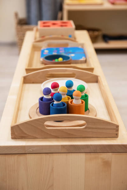 Montessori wood material for the learning of children Montessori wood material for the learning of children at children school classroom empty education desk stock pictures, royalty-free photos & images