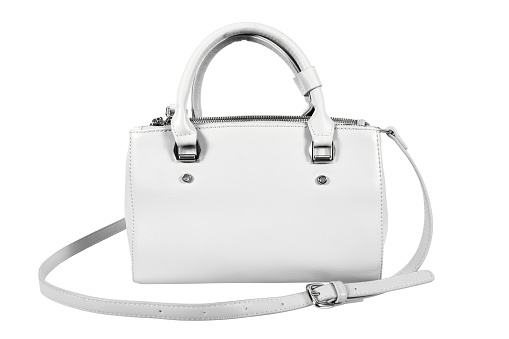 White leather woman handbag isolated on white background. White lady shoulder handbag with strap isolated