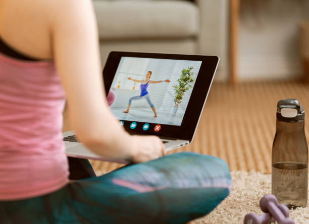 istock woman doing exercises at home 1284856547