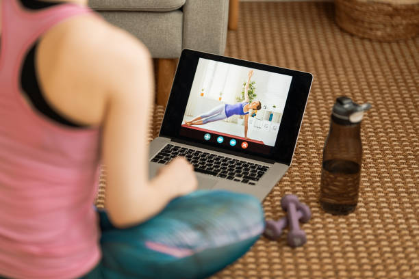 istock woman doing exercises at home 1284856567