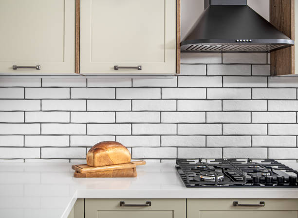 istock White modern kitchen interior. On a countertop lies a loaf of bread. 1284857762