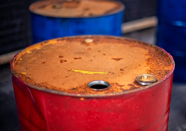istock colored barrel for fuel, red and blue. 1284858915