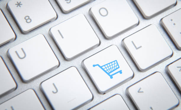 istock Shopping cart symbol on a computer keyboard. 1284862618