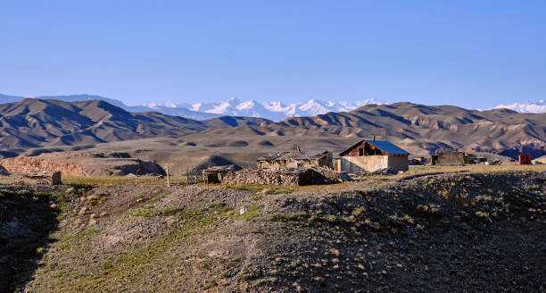 Countryside Mountains Kazakhstan Dilapidated housing in rural areas in Kazakhstan soldier on the wall stock pictures, royalty-free photos & images