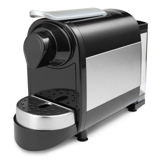 istock capsule coffee machine, black and silver, on a white background, diagonal arrangement 1284867183