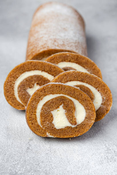 istock Pumpkin cake roll with cream cheese filling 1284869816