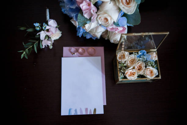 istock wedding invitation with bridal bouquet and rings 1284869996