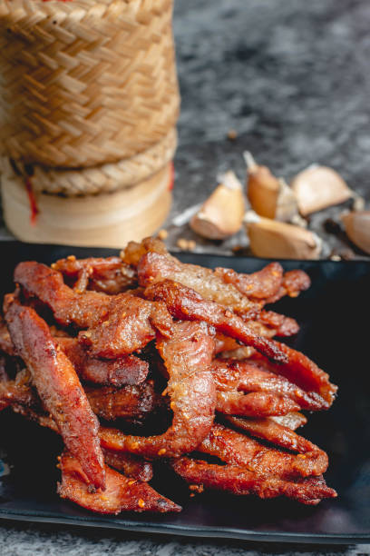 istock deep fried sun-dried pork (Moo dad deaw), Thai food 1284871312