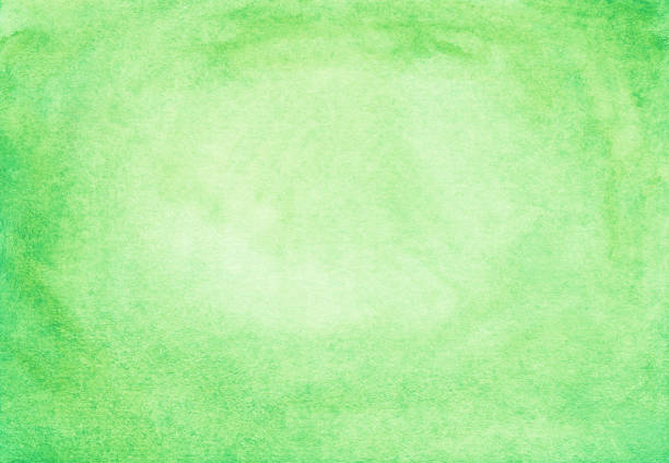 istock Watercolor light green background texture with space for text. Aquarelle greenery color backdrop. 1284873742