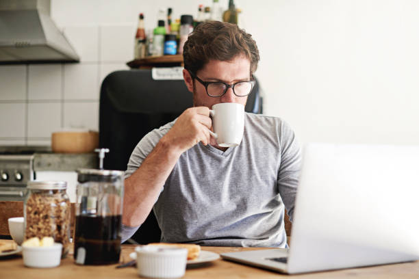 istock Starting the day with his social network 1284873920