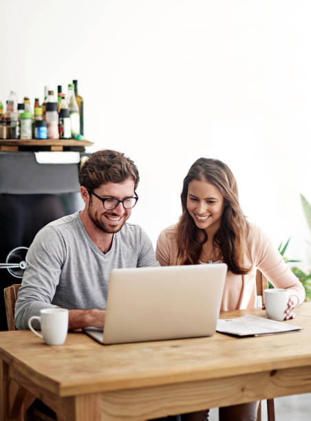 istock Technology keeps them in sync with their daily to do's 1284873983