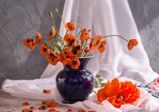 A Little Red Poppies Bouquet Arranged In Classical Style