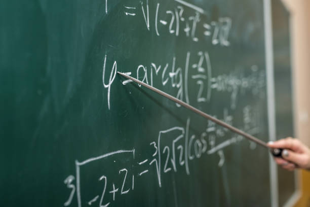 istock Mathematical formulas are written on the blackboard 1284877168