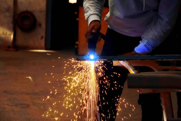 istock cutting iron and steel with cnc laser and plasma 1284878126